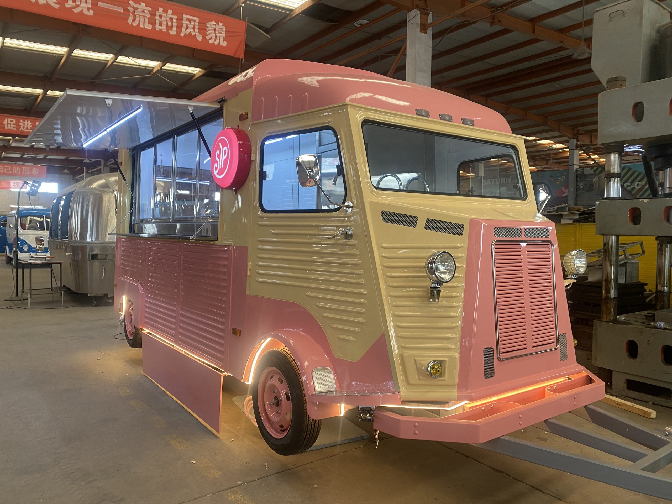 Citroën HY coffee trailer angled view inside factory