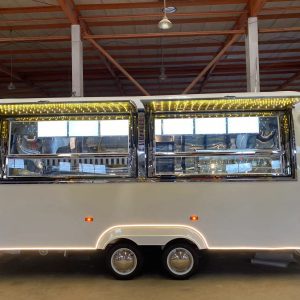 6m white aluminum double arc food trailer with dual serving windows and LED canopy lighting for mobile catering business