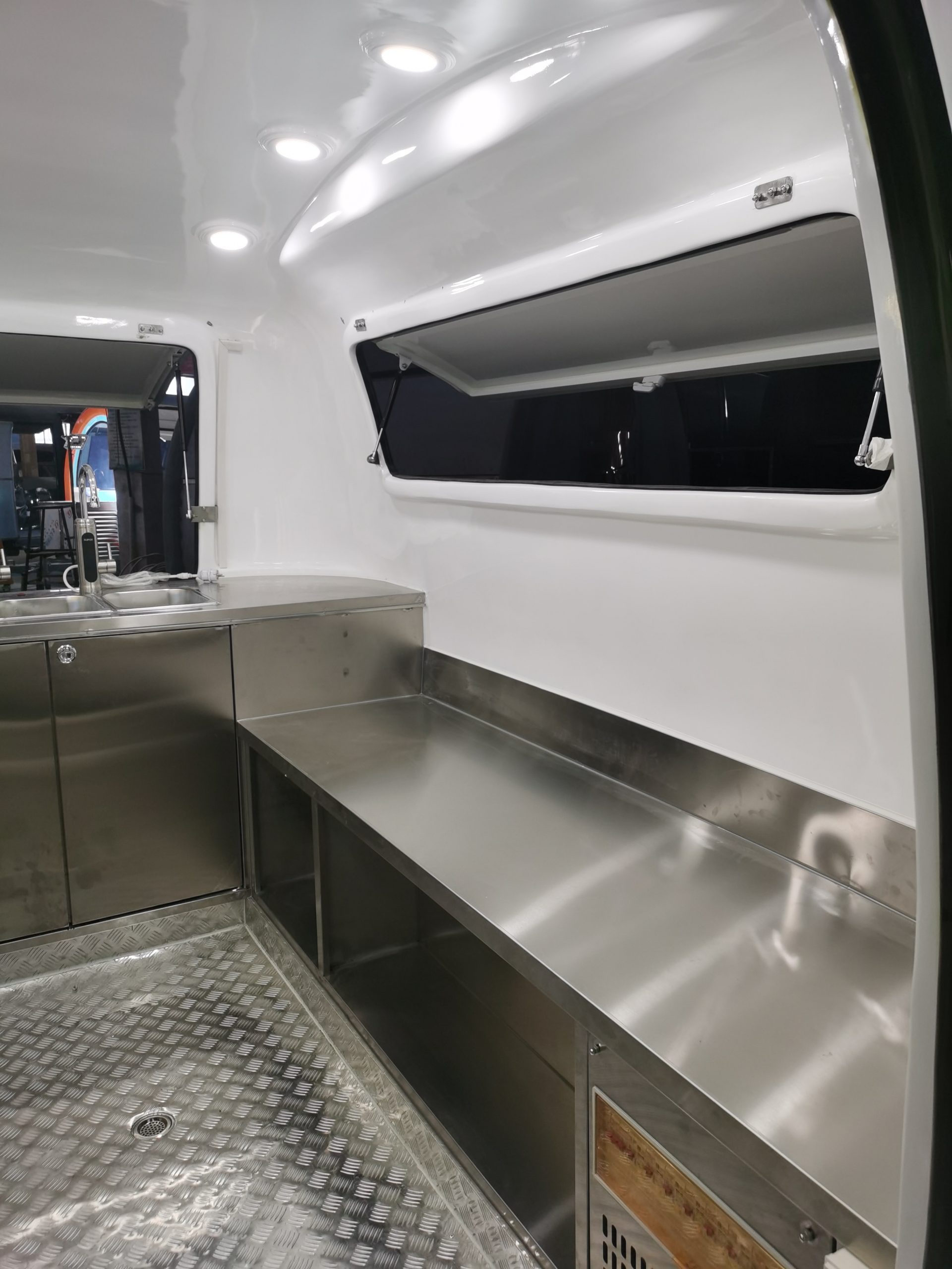 Interior side view of 2.8M compact retro coffee and food trailer