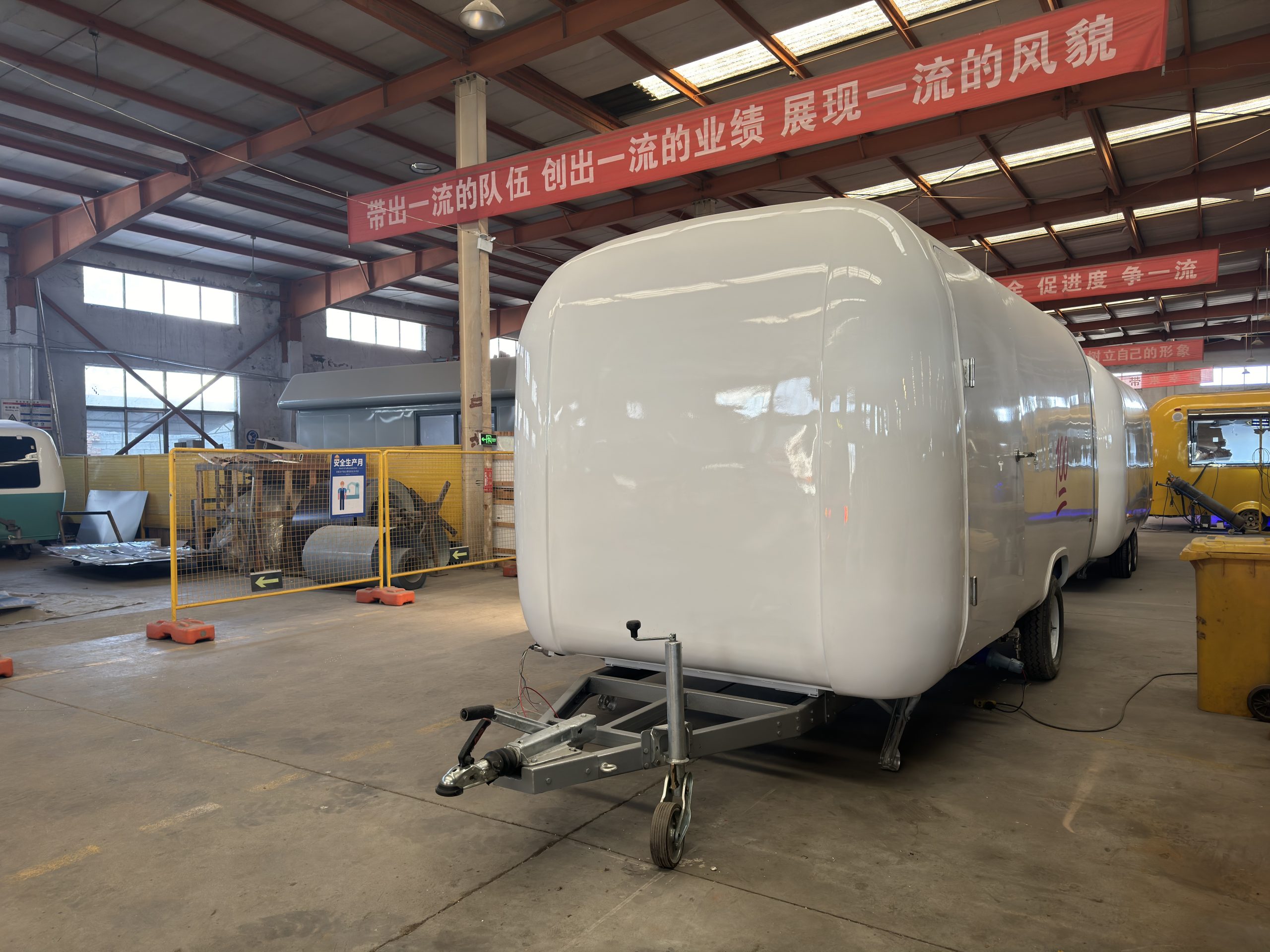 Fiberglass mobile coffee trailer with modern rounded design customized for Qatar coffee business