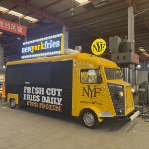 Retro Citroen food truck with custom NYF branding for Dubai French fries business and mobile catering operations.