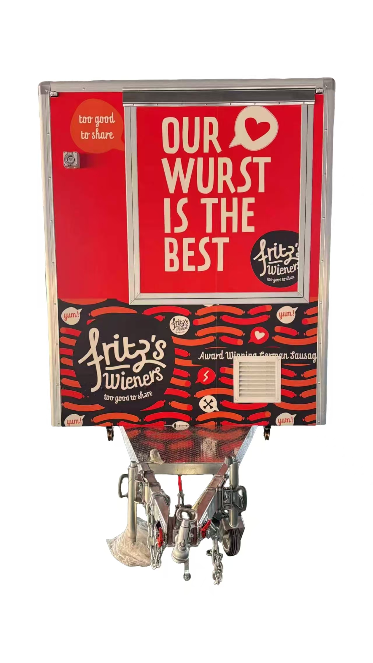Front view of custom Australian fiberglass food trailer with towing hitch and commercial advertising graphics