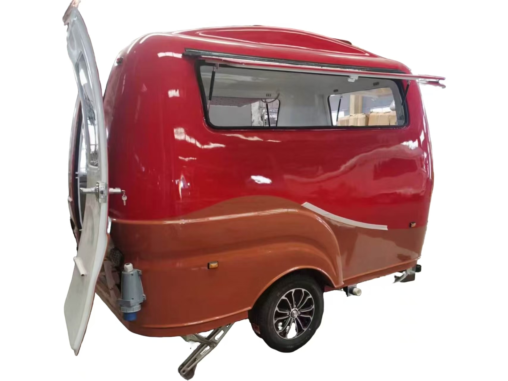 Compact fiberglass retro food trailer with side serving hatch and custom paint finish