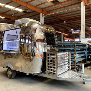 Custom stainless steel ice cream trailer with display freezers and illuminated serving window for Saudi Arabia