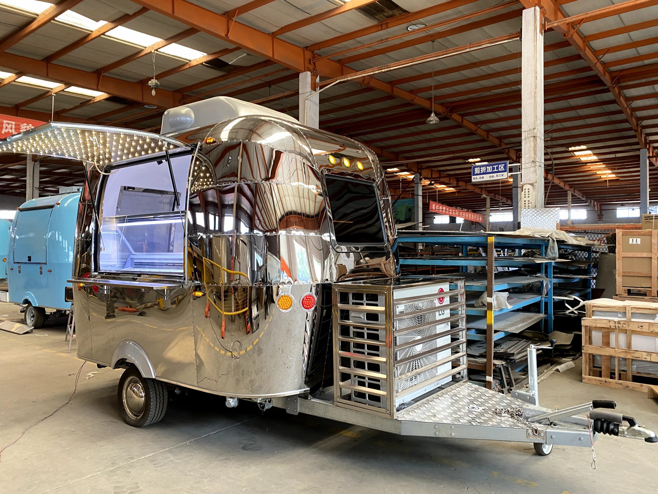 Custom stainless steel ice cream trailer with display freezers and illuminated serving window for Saudi Arabia