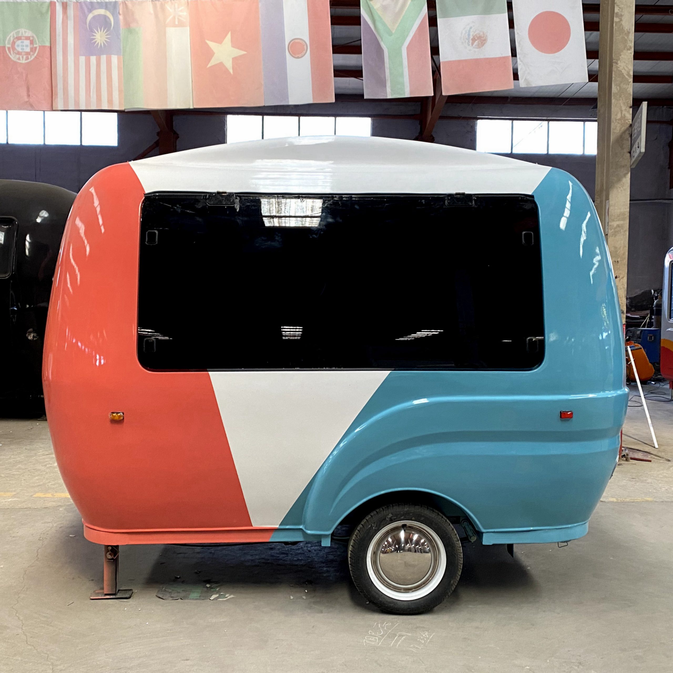 BCF-10 compact retro food trailer side view with fiberglass body and large serving window